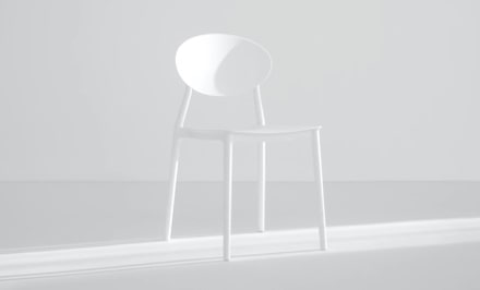 Light-colored contemporary chair demonstrating versatile modern styling